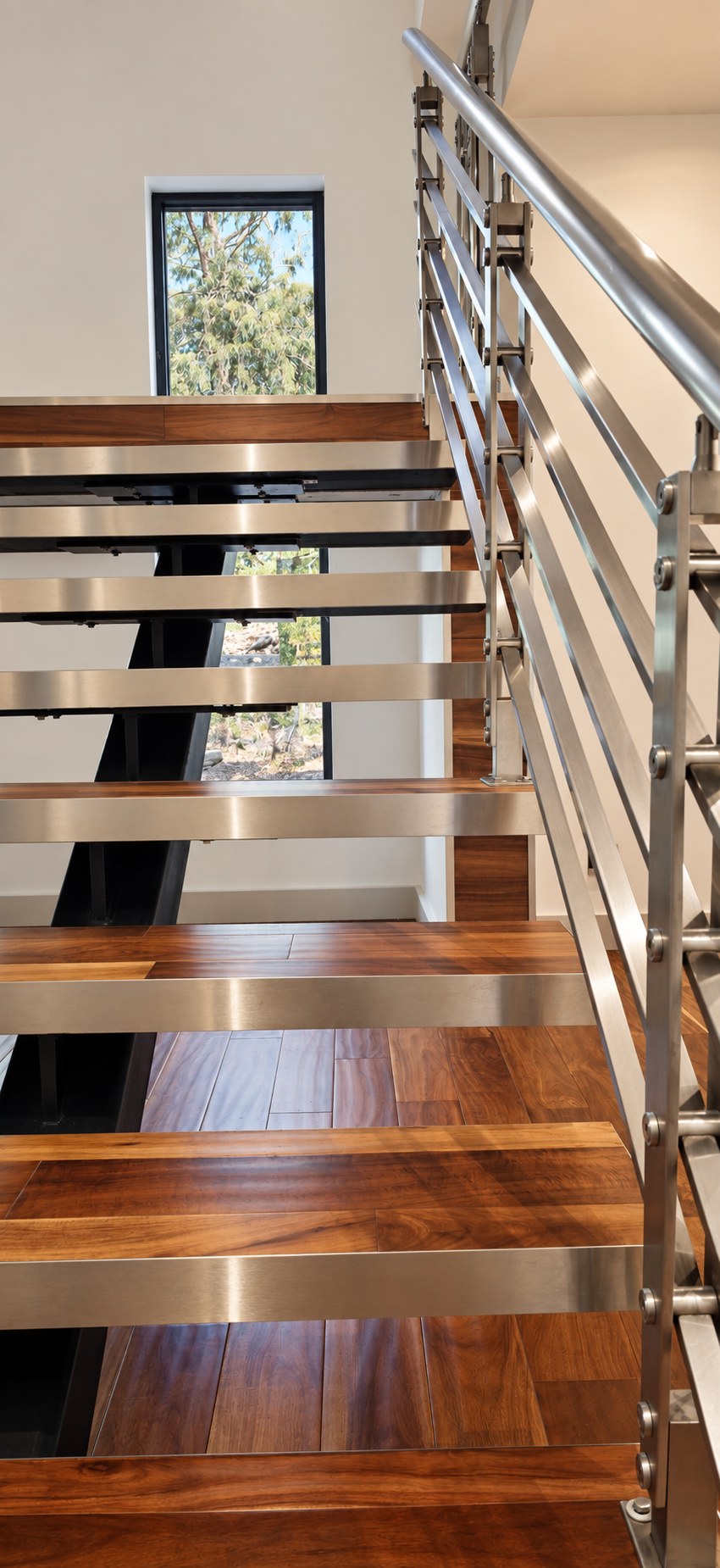 Architectural staircase connecting the residence